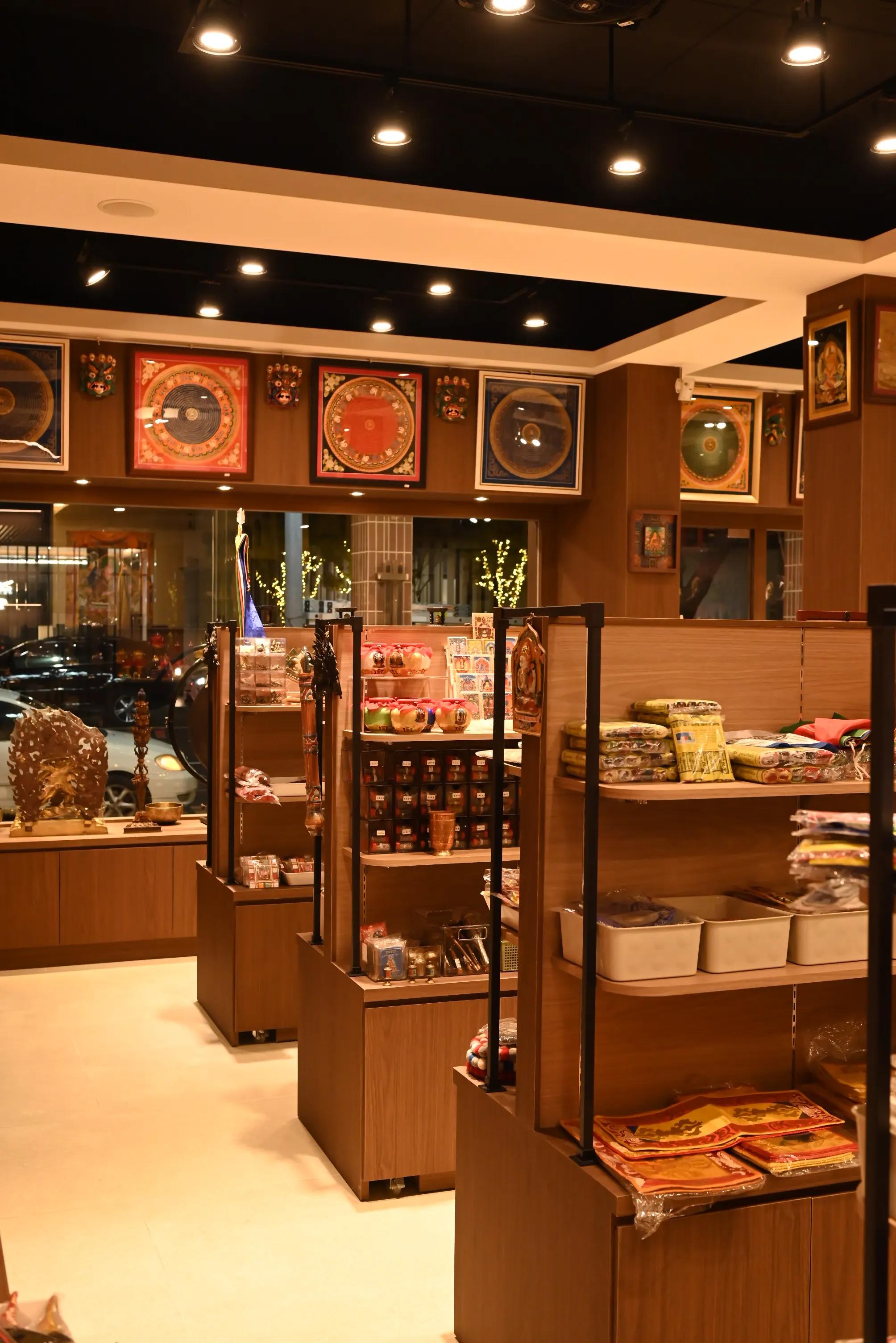 Himalayan Singing Bowl store interior with thangka art and retail display